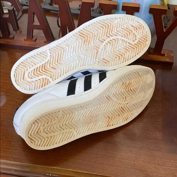 Adidas White and Black Athletic Shoes with Striking Design
