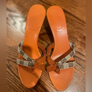 Elegant Brown Leather Sandals with Ornate Buckles