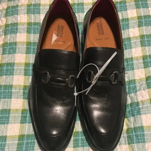 Johnston &amp; Murphy Black Leather Slip-On Loafers