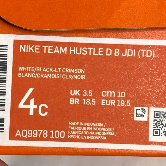 Nike Team Hustle D8 white black athletic shoes