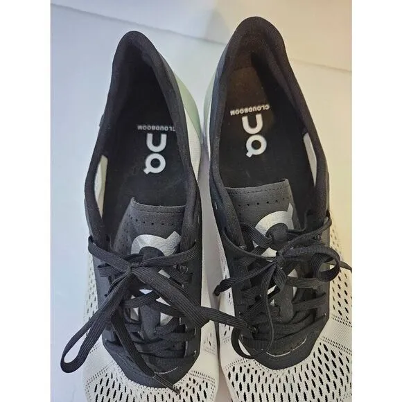 On Running On Cloud white, black and green running shoes. Size 10.5.
