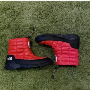 The North Face Red and Black Quilted Thermo Winter Boots