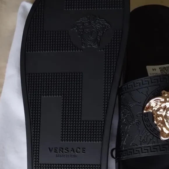 Versace Black and Gold Sandals with Signature Medusa Design