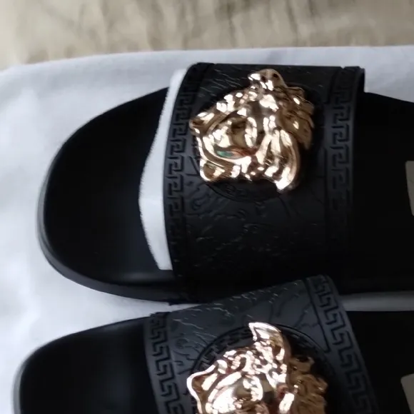 Versace Black and Gold Sandals with Signature Medusa Design