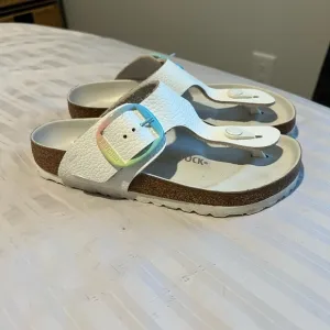 White Birkenstock Gizeh Sandals with Rainbow Buckle. Size 35